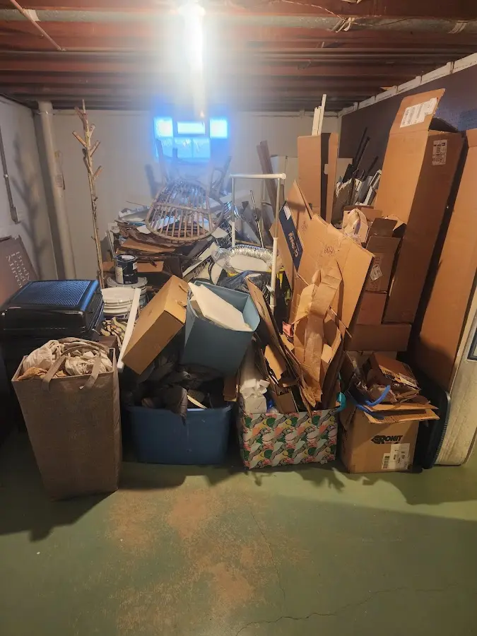 Roll-off dumpster container at job site for 2 Yard Dumpster Rental in Walworth